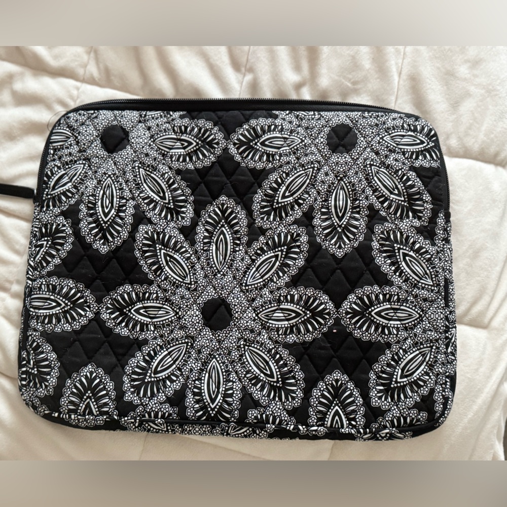 Vera Bradley Black and White Quilted laptop sleeve with zipper closure.